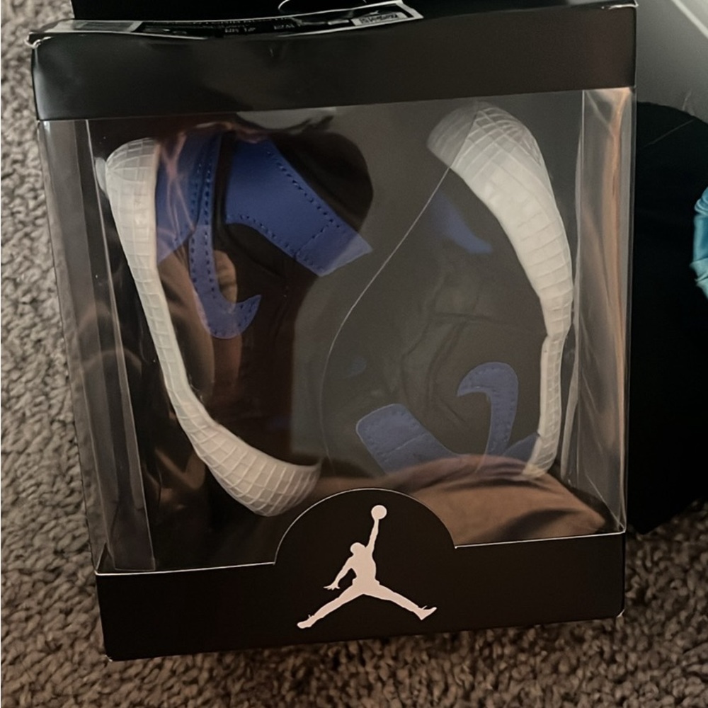 Jordan 1 Crib Bootie in Black and Royal Blue